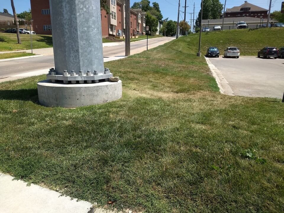 Before image of the parking lot lawn at the University of Nebraska Medical Center. A year later this lawn was 100% native plant prairie in urban Omaha.
